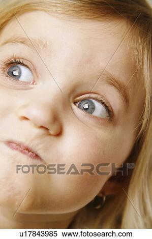 Little girl making a face View Large Photo Image Stock Photography - Little girl making a face. Fotosearch