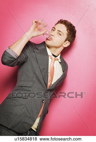 Stock Photo - man drinking water. Fotosearch