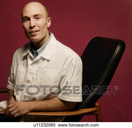 Stock Image - Man in white lab coat. Fotosearch - Search Stock Photos, Mural Pictures, Photographs, and Photo Clipart