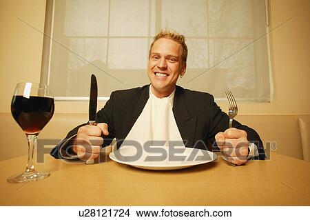 Man waiting for food View Large Photo Image Picture - Man waiting for food. Fotosearch