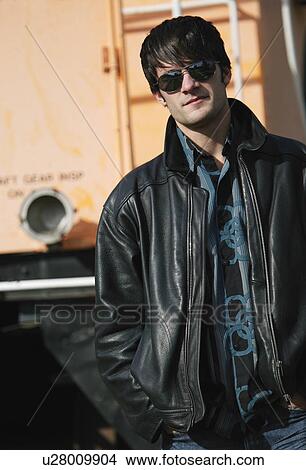 Picture - Man wearing sunglasses. Fotosearch