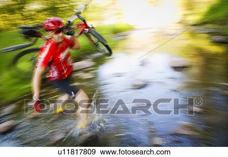 Stock Photo - Mountain biker. Fotosearch