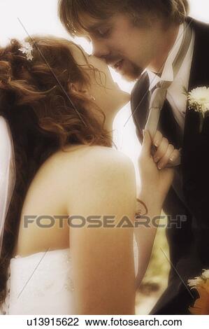 Stock Image - Newly married kiss. Fotosearch