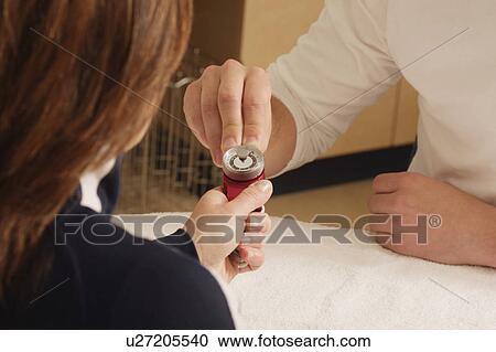 Stock Image - Occupational therapist at work. Fotosearch