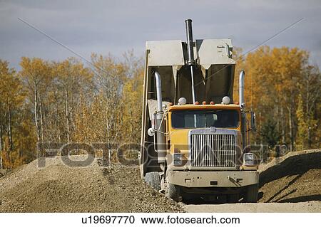 offloading at the gravel pit View Large Photo Image Stock Image - offloading at the gravel pit. Fotosearch