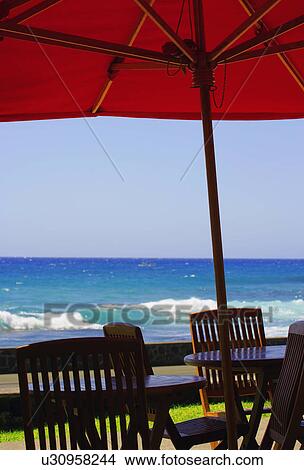 Picture - Patio set at ocean. Fotosearch