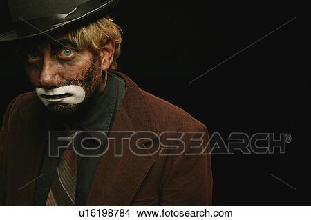 Picture - Peering from darkness. Fotosearch