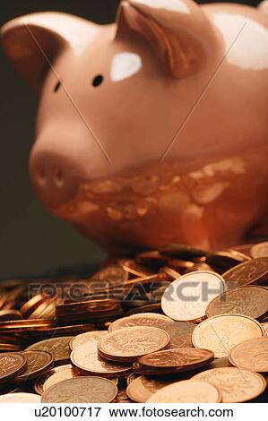 Stock Photo - Piggy bank and coins. Fotosearch