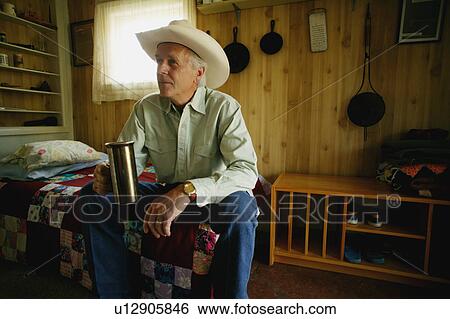 Stock Photograph - Portrait of a cowboy. Fotosearch