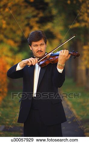 Portrait of a violinist View Large Photo Image Stock Photo - Portrait of a violinist. Fotosearch