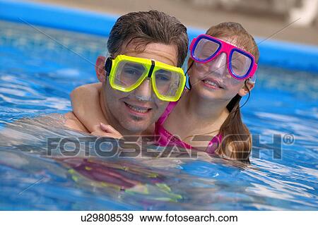 Portrait of father and daughter snorkeling View Large Photo Image Stock Photo - Portrait of father and daughter snorkeling. Fotosearch