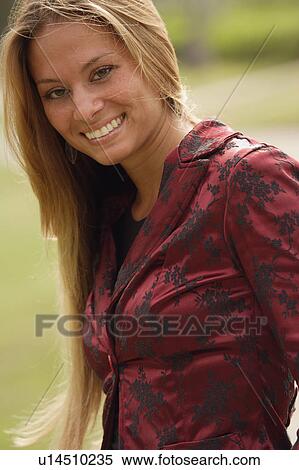 Portrait of woman wearing red brocade jacket View Large Photo Image Stock Photography - Portrait of woman wearing red brocade jacket. Fotosearch