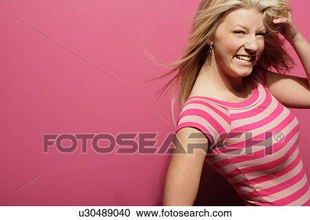 Stock Image - Pretty blonde lady. Fotosearch