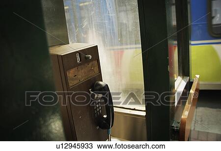Stock Image - Public phone booth. Fotosearch