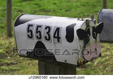 Stock Image - Quaint country mailbox. Fotosearch