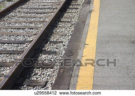 Railway platform and track View Large Photo Image Stock Image - Railway platform and track. Fotosearch