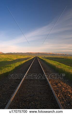 Railway track in the distance View Large Photo Image Stock Image - Railway track in the distance. Fotosearch