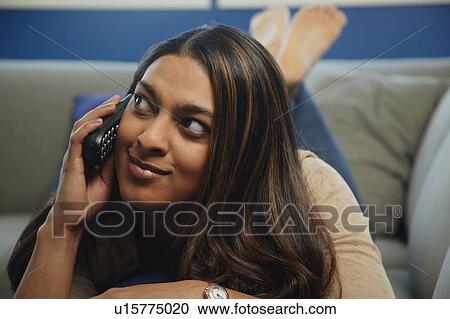 Relaxed phone call View Large Photo Image Stock Image - Relaxed phone call. Fotosearch