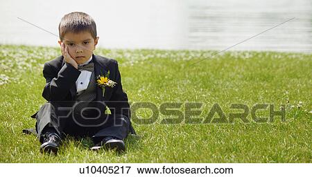 Stock Photo - Ring barer sits and waits. Fotosearch