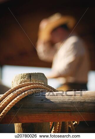 Stock Photograph - Rope on fence. Fotosearch