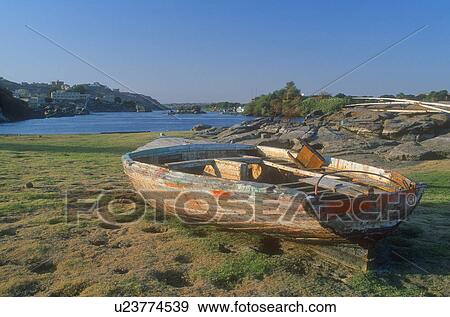 Stock Photo - Rowboat abandoned. Fotosearch
