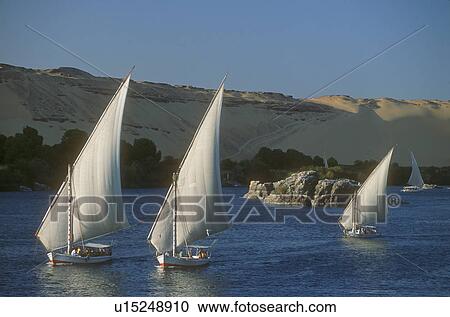 Sailboats on water View Large Photo Image Stock Image - Sailboats on water. Fotosearch