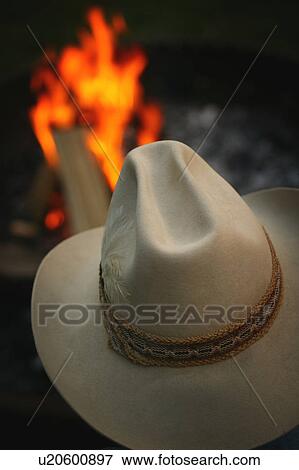 Stock Photo - Sitting by the fire. Fotosearch