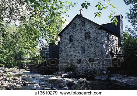 Stone house by the riverbank View Large Photo Image Stock Photo - Stone house by the riverbank. Fotosearch