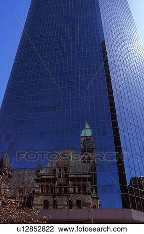 Traditional building reflected in glass skyscraper View Large Photo Image Stock Image - Traditional building reflected in glass skyscraper. Fotosearch