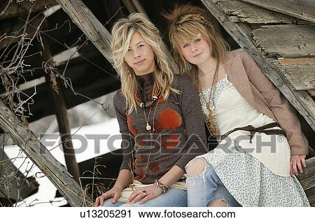 Two trendy teenage girls View Large Photo Image Stock Image - Two trendy teenage girls. Fotosearch