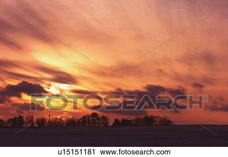 Stock Image - Vast sky and sunset. Fotosearch
