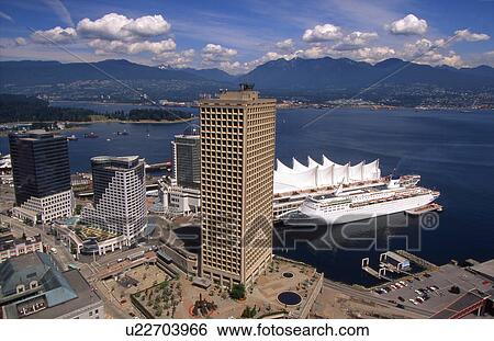 Stock Photograph - View of bay, boats and buildings. Fotosearch