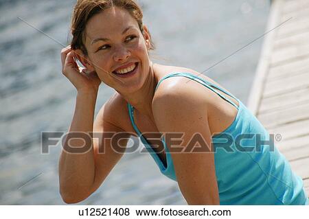 Woman enjoying the summer View Large Photo Image Stock Photo - Woman enjoying the summer. Fotosearch