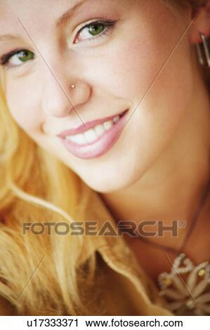 Stock Image - Woman with green eyes. Fotosearch