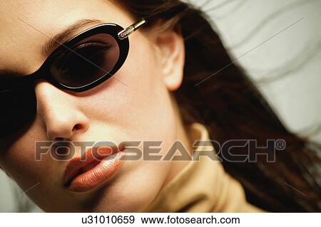 Woman with sunglasses View Large Photo Image Stock Photo - Woman with sunglasses. Fotosearch