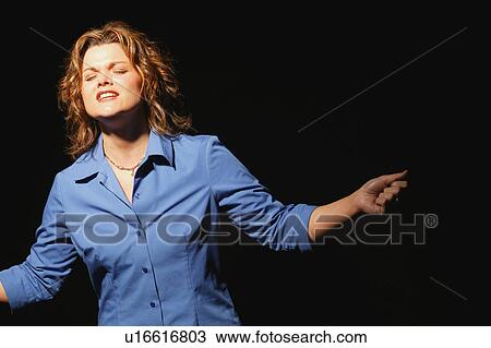 Stock Image - Woman worshipping. Fotosearch