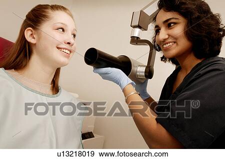 X-ray being taken for teeth View Large Photo Image Stock Photo - X-ray being taken for teeth. Fotosearch