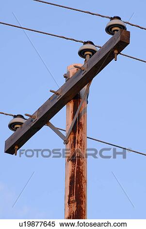 A close-up of a powerline A closeup of a powerline A close up of a powerline View Large Photo Image Stock Photography - A close-up of a powerline A closeup of a powerline A close up of a powerline. Fotosearch
