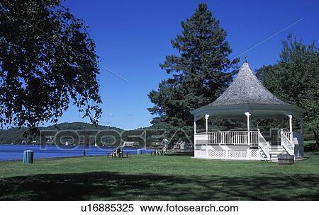 Stock Photography - A gazebo in a park near a body of water. Fotosearch