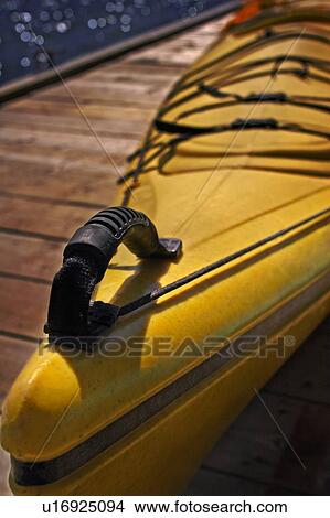 Picture - A kayak on a dock. Fotosearch