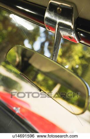 Stock Photograph - A rear-view mirror in a car. Fotosearch