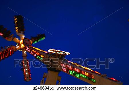 A ride at an amusement park View Large Photo Image Stock Photography - A ride at an amusement park. Fotosearch