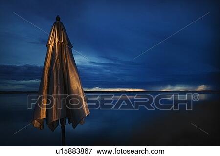 Stock Photo - Beautiful sunset over water. Fotosearch