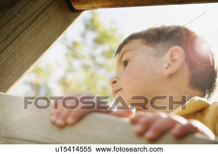 Boy Climbing Side Profile View Large Photo Image Stock Photography - Boy Climbing Side Profile. Fotosearch