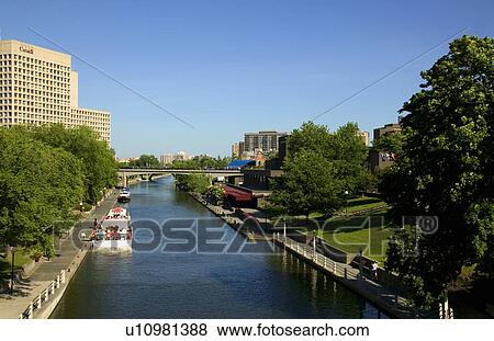 Stock Photo - Canal and local architecture. Fotosearch