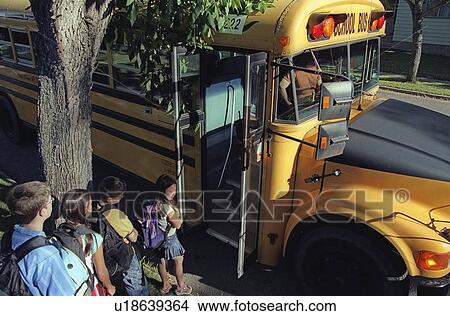 Children loading a school bus View Large Photo Image Picture - Children loading a school bus. Fotosearch