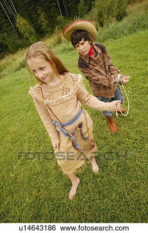 Children play cowboys and Indians View Large Photo Image Stock Photograph - Children play cowboys and Indians. Fotosearch