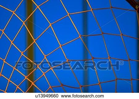 Stock Image - Closeup of a goalie net. Fotosearch