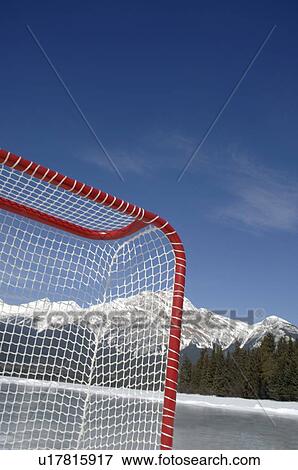 Hockey net against mountains View Large Photo Image Stock Photo - Hockey net against mountains. Fotosearch
