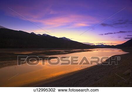 Stock Image - Medicine Lake at Sunset Jasper National Park. Fotosearch